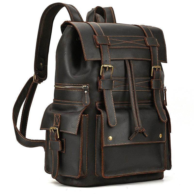 Mens brown leather backpack by VacationGrabs featuring multiple pockets and adjustable straps