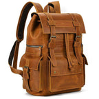 Mens brown leather backpack with multiple pockets and adjustable straps for travel and everyday use