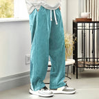 Men's comfortable travel pants in teal, perfect for casual outings
