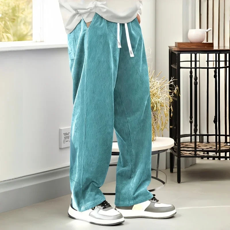 Men's comfortable travel pants in teal, perfect for casual outings