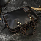 Mens double zipper briefcase in black leather with sturdy handles and sleek design for professional use