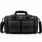 Men's duffle bag in black leather for travel and gym use