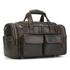 Men's duffle bag in dark brown leather for travel and gym use