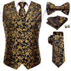 Men's black and gold patterned suit vest with matching tie and accessories
