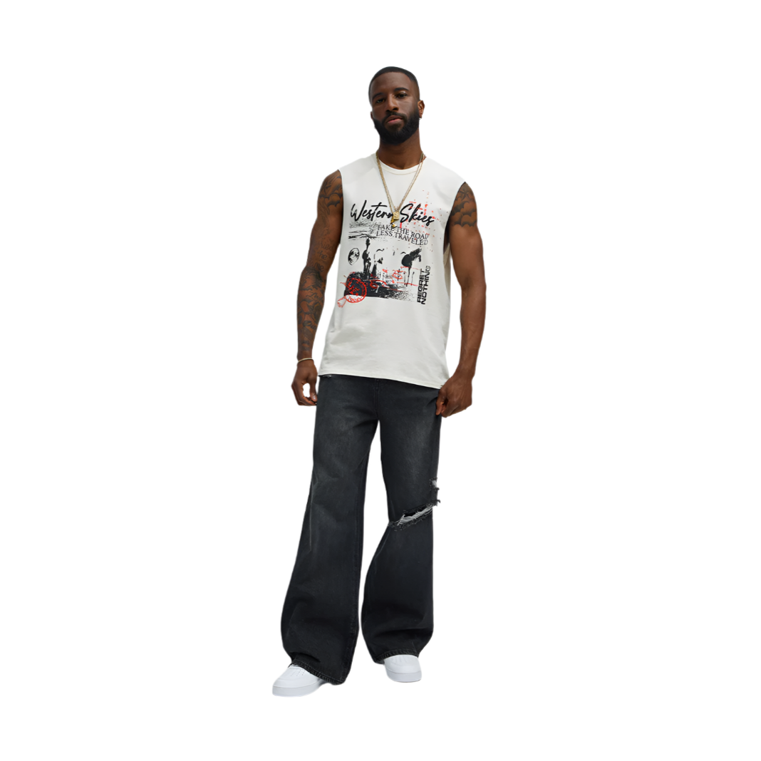 Mens graphic sleeveless shirt in white with black and red design worn with ripped black jeans and white sneakers