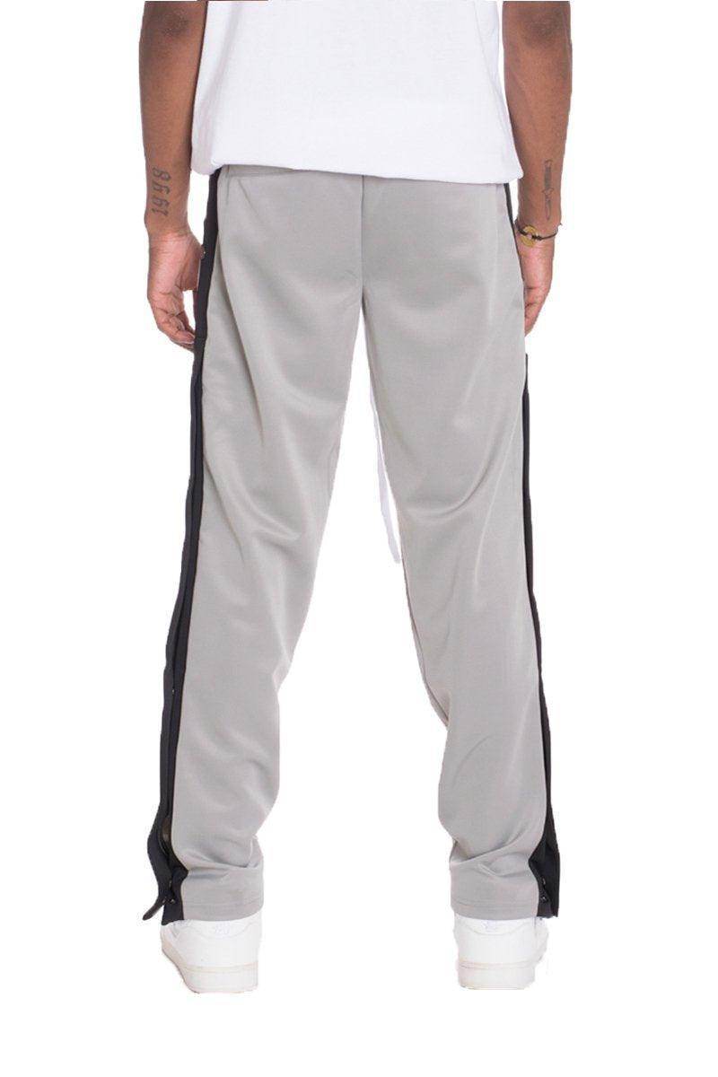 Men's gray snap button track pants by VacationGrabs featuring stylish side stripes and comfortable fit