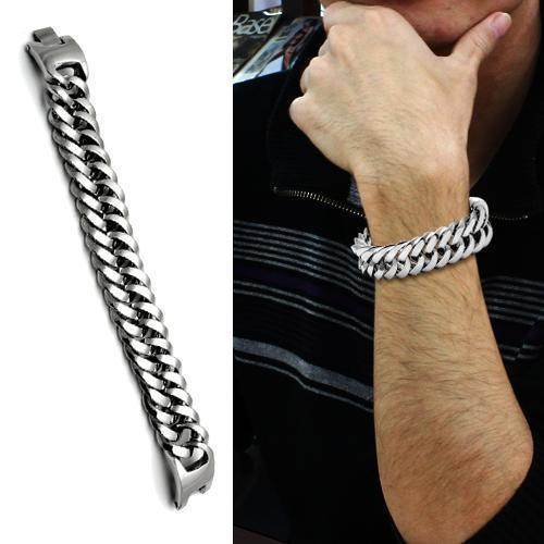 Men's high polished bracelet in silver on a model's wrist showcasing its stylish design