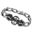 Men's high polished bracelet with skull designs and bold chain links for a unique style.