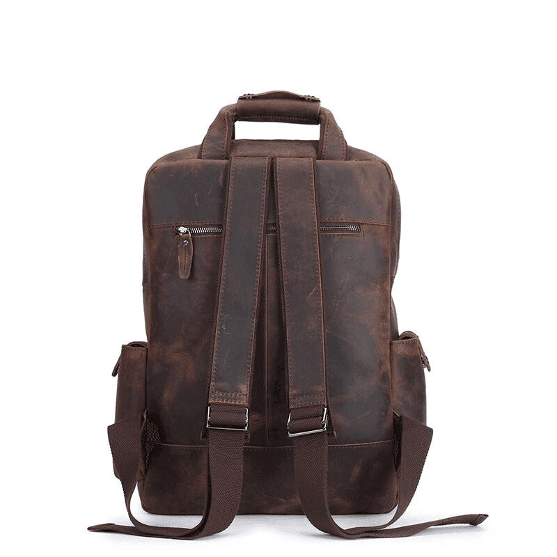 Mens leather backpack large in dark brown with padded straps and multiple compartments