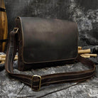 Mens leather crossbody bags in dark brown with adjustable strap and classic design for everyday use