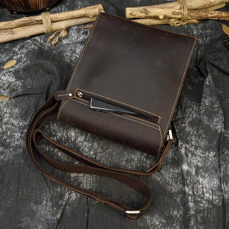 Brown mens leather crossbody bags with a front pocket for easy access to essentials