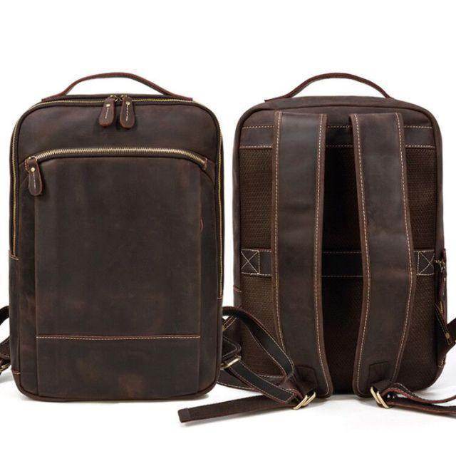 Mens leather laptop backpack by VacationGrabs with spacious compartments and a sleek design