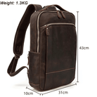 Mens leather laptop backpack in brown with multiple compartments for organization and comfort