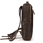 Side view of a stylish mens leather laptop backpack featuring multiple pockets and durable straps