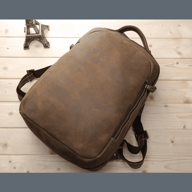 Mens leather travel backpack by VacationGrabs with a spacious design and durable construction