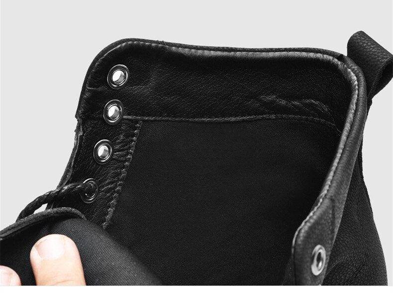 Interior view of men's leather walking boots showing durable stitching and eyelets for laces