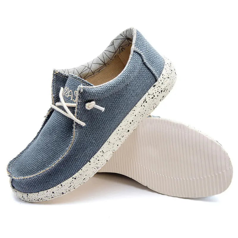 Men's lightweight travel city walk shoes in blue canvas, perfect for urban adventures