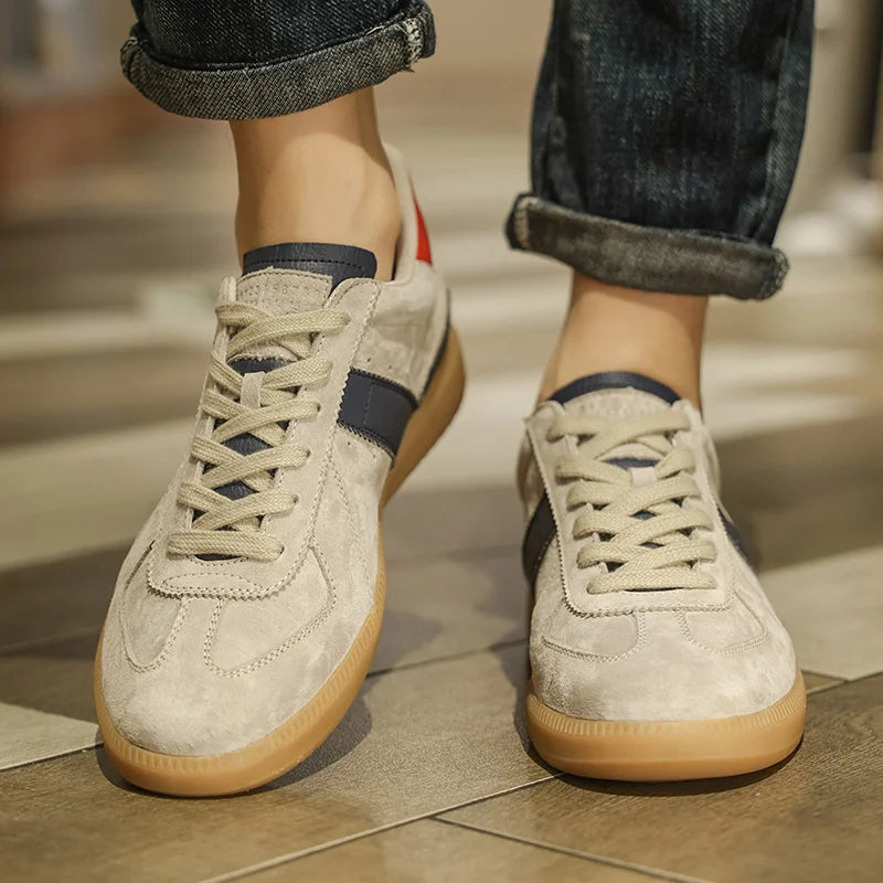 Men's loafers in beige suede with navy accents for casual wear