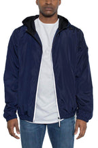 Mens navy blue windbreaker jacket with a hood and zip closure, perfect for casual wear