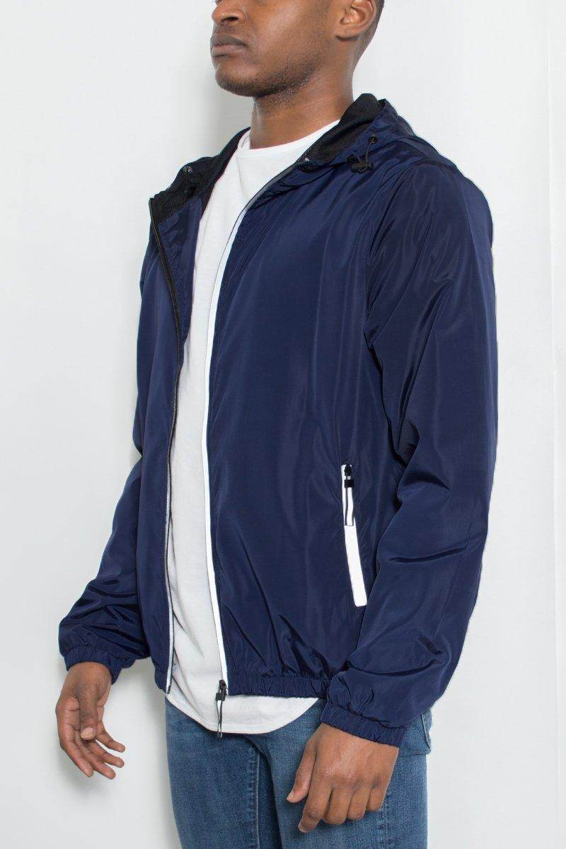 Mens navy blue windbreaker jacket with zip closure and side pockets for casual wear