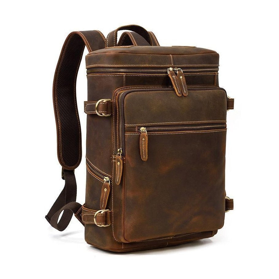 Mens retro laptop backpack in dark brown leather with multiple pockets and adjustable straps