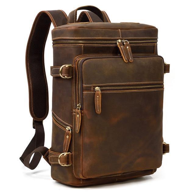 Mens retro laptop backpack in brown leather with multiple pockets and adjustable straps