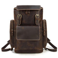 Mens retro laptop backpack in brown leather with multiple pockets and adjustable straps for travel