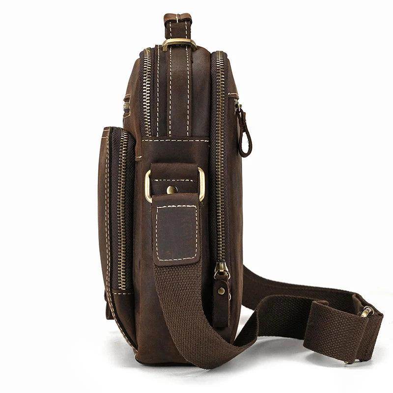 Mens retro leather shoulder bag with multiple zippered pockets and an adjustable strap