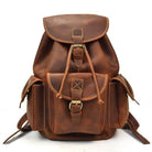 Mens retro rucksack in brown leather with multiple pockets and adjustable straps for stylish storage