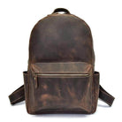 Mens retro rucksack in vintage brown leather with front zipper pocket and adjustable straps