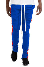 Men's royal blue joggers with red side stripes and adjustable drawstring for comfort and style