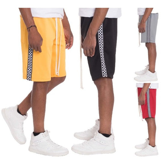 Mens side tape checkered shorts in yellow black grey and red with white drawstrings worn by models