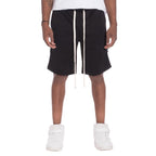 Black mens side tape checkered shorts by WEIV with white drawstrings worn with white sneakers