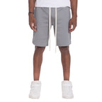 Mens side tape checkered shorts in gray with white drawstrings worn with white sneakers