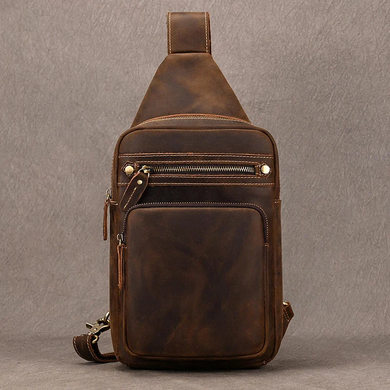 Mens sling shoulder bag made of brown leather, perfect for casual outings