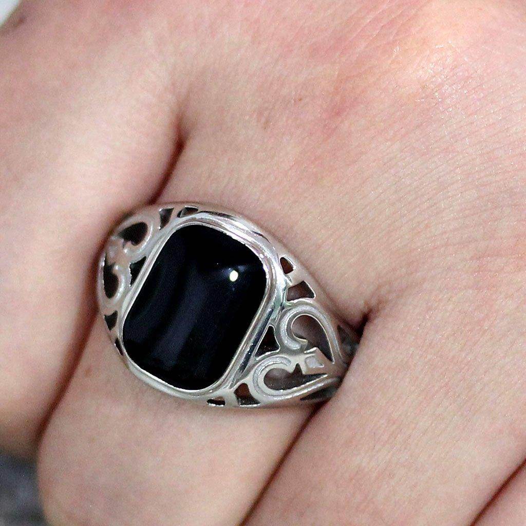 Men's stainless steel ring featuring an onyx stone with intricate filigree design