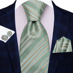Men's green striped tie with matching pocket square, ideal for formal wear