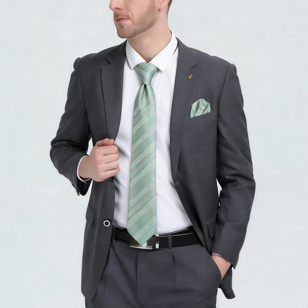 Men's gray suit with mint green tie, perfect for formal events