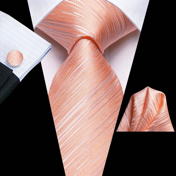 Men's peach silk tie with matching pocket square for formal events