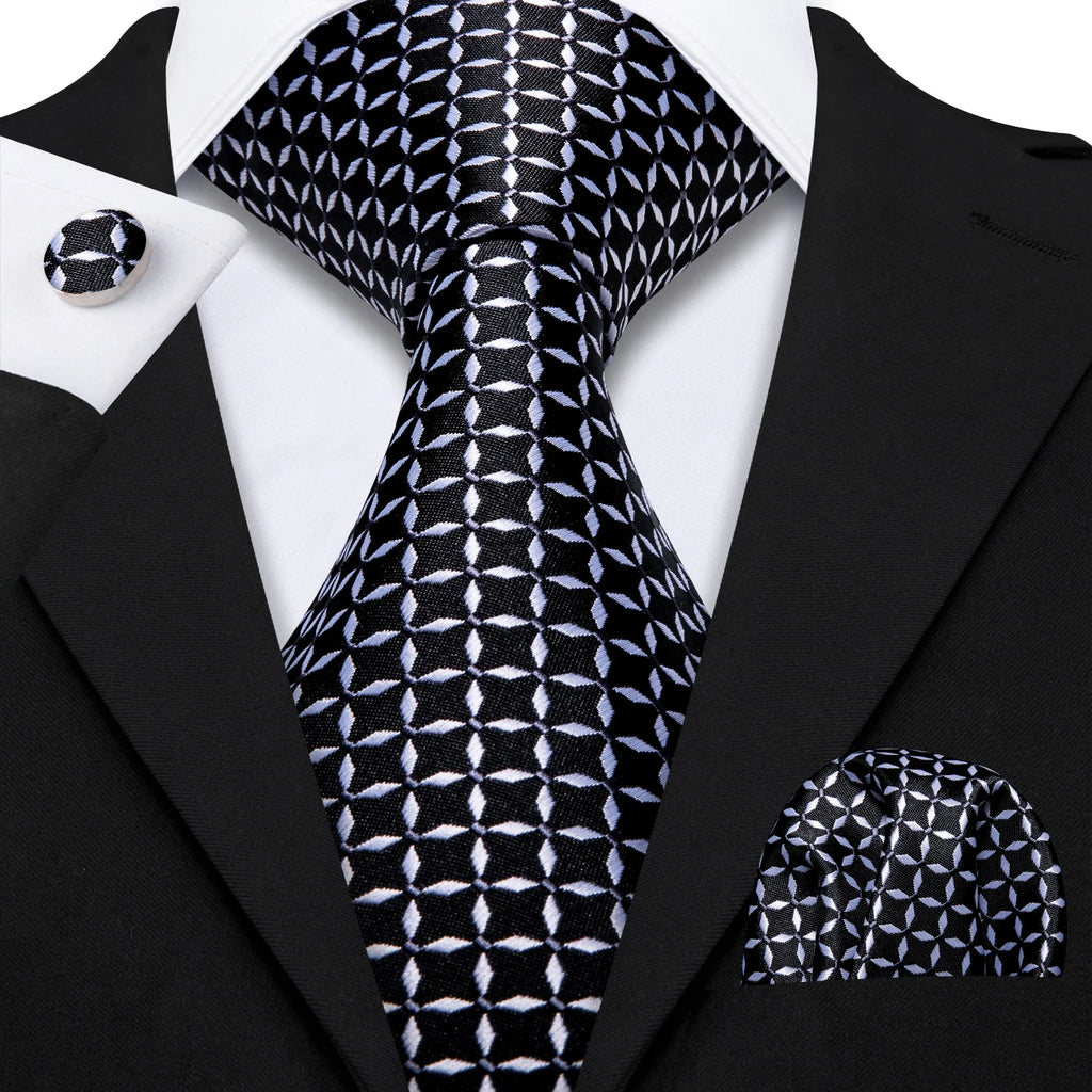 Men's black and white patterned silk tie, perfect for formal events
