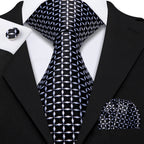 Men's black and white patterned silk tie, perfect for formal events