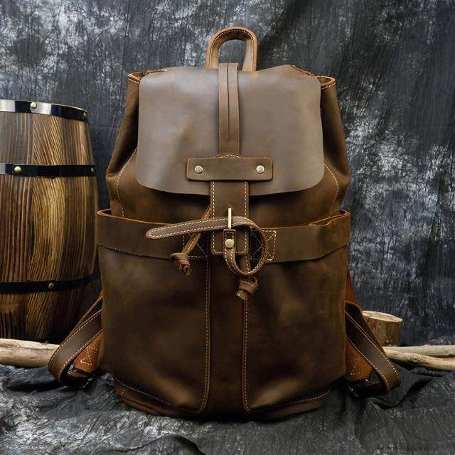 Mens vintage leather backpack by VacationGrabs with adjustable straps and stylish buckle closure
