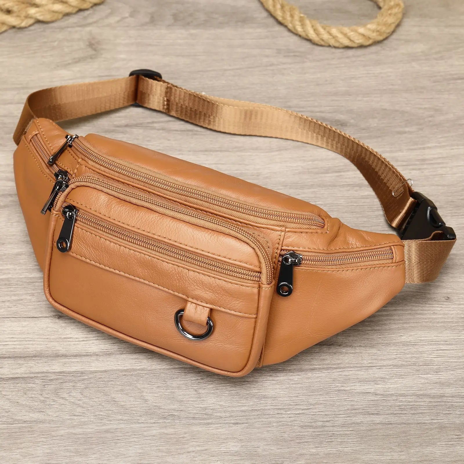 Men's leather waist bag in tan, ideal for travel and daily use