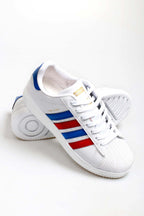 Men's White Leather Sneakers with Patriotic Stripe Details – styled view