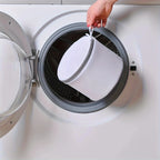 White mesh bag laundry for delicate items in washing machine