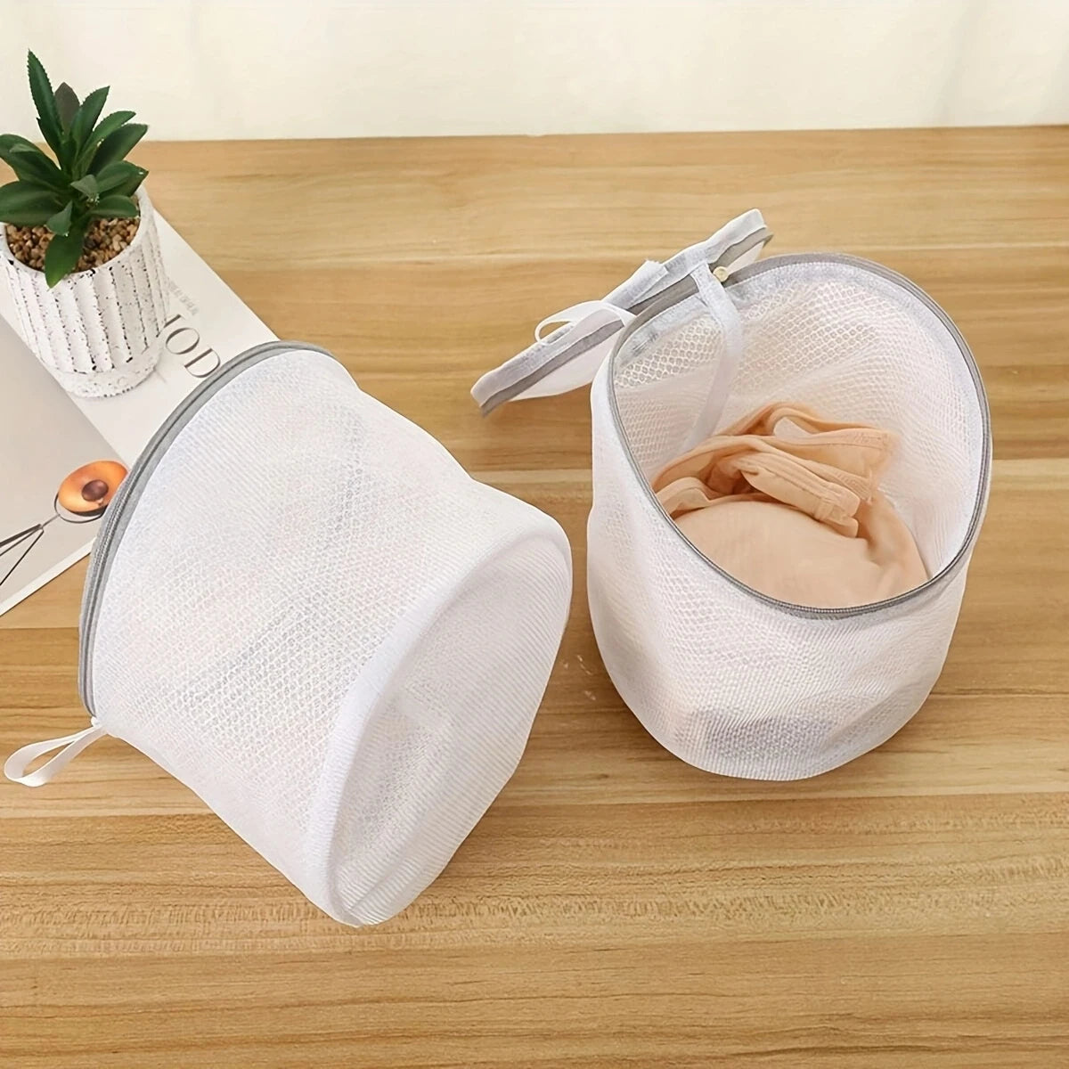 White mesh bag laundry for delicate clothing and fabrics