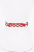 Red metal studded fashion belt from VacationGrabs with eye-catching silver studs for trendy outfits