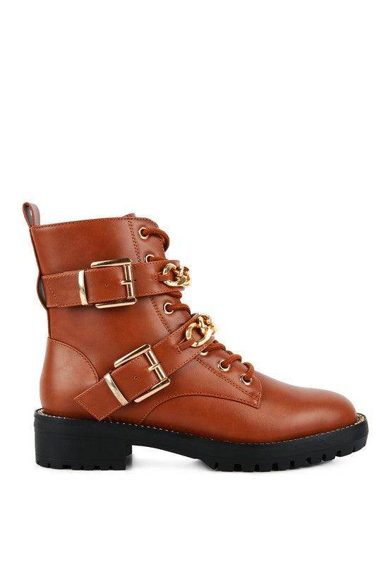 Brown metallic accent motorcycle boots with dual buckle straps and rugged sole for stylish comfort
