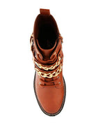 Stylish women's metallic accent motorcycle boots with chain detail and sturdy sole