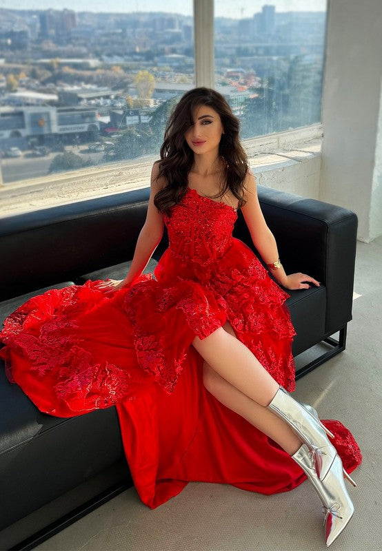 Rag Company metallic high ankle boots worn by woman in red dress sitting on black couch
